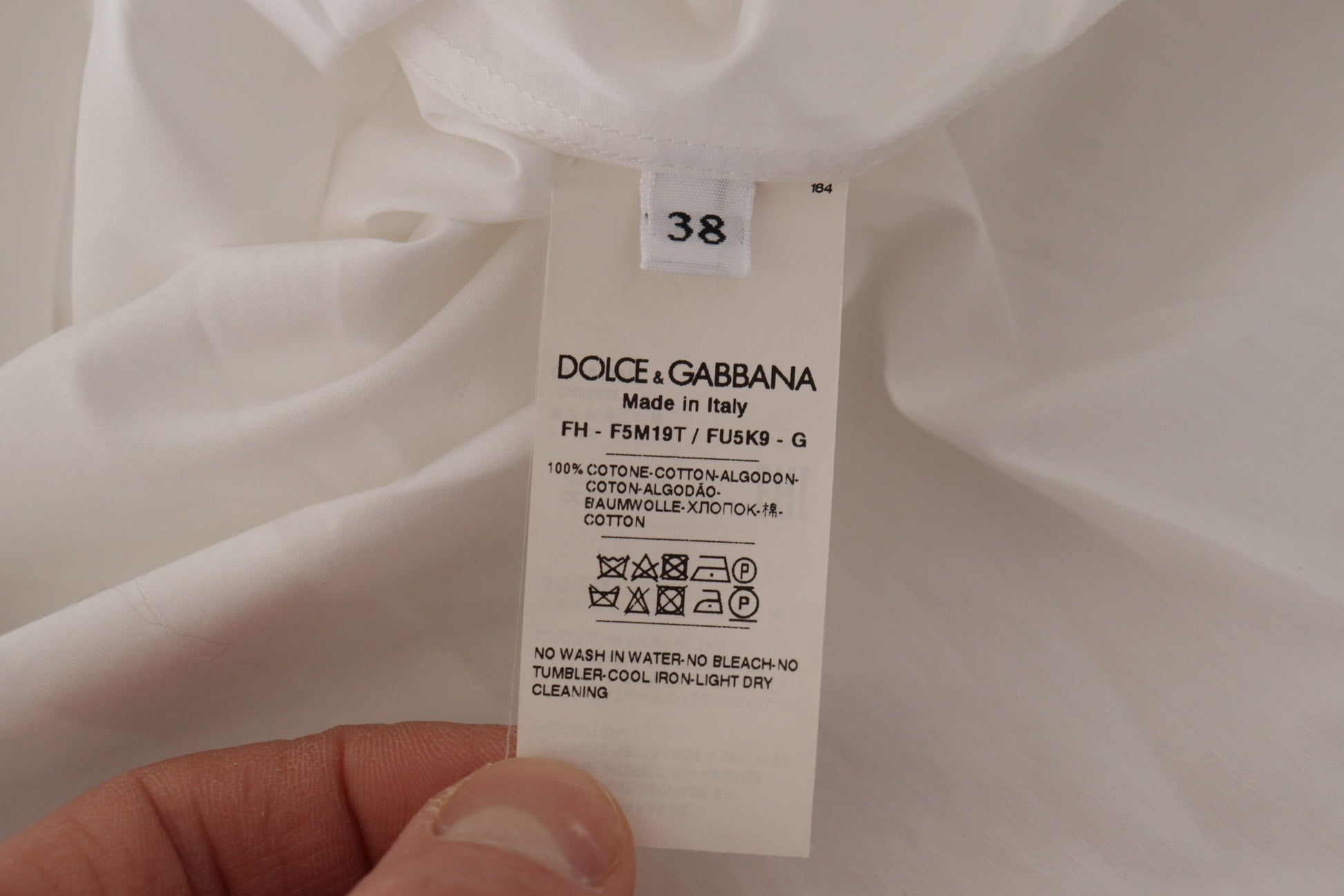 Chemisier de smoking blanc sans manches Dolce &amp; Gabbana