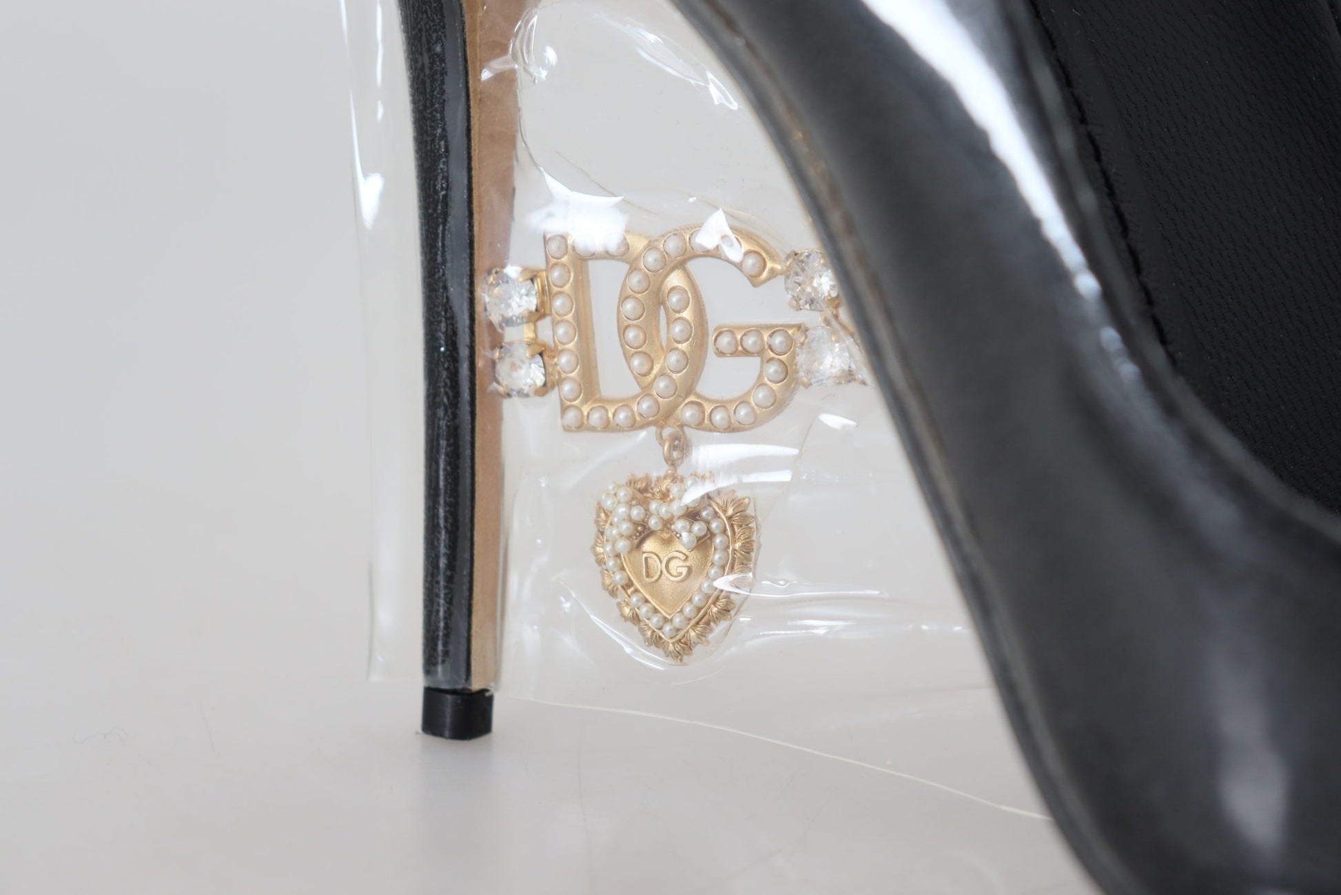 Escarpins à talons en cuir noir Dolce &amp; Gabbana, chaussures enveloppées de plastique
