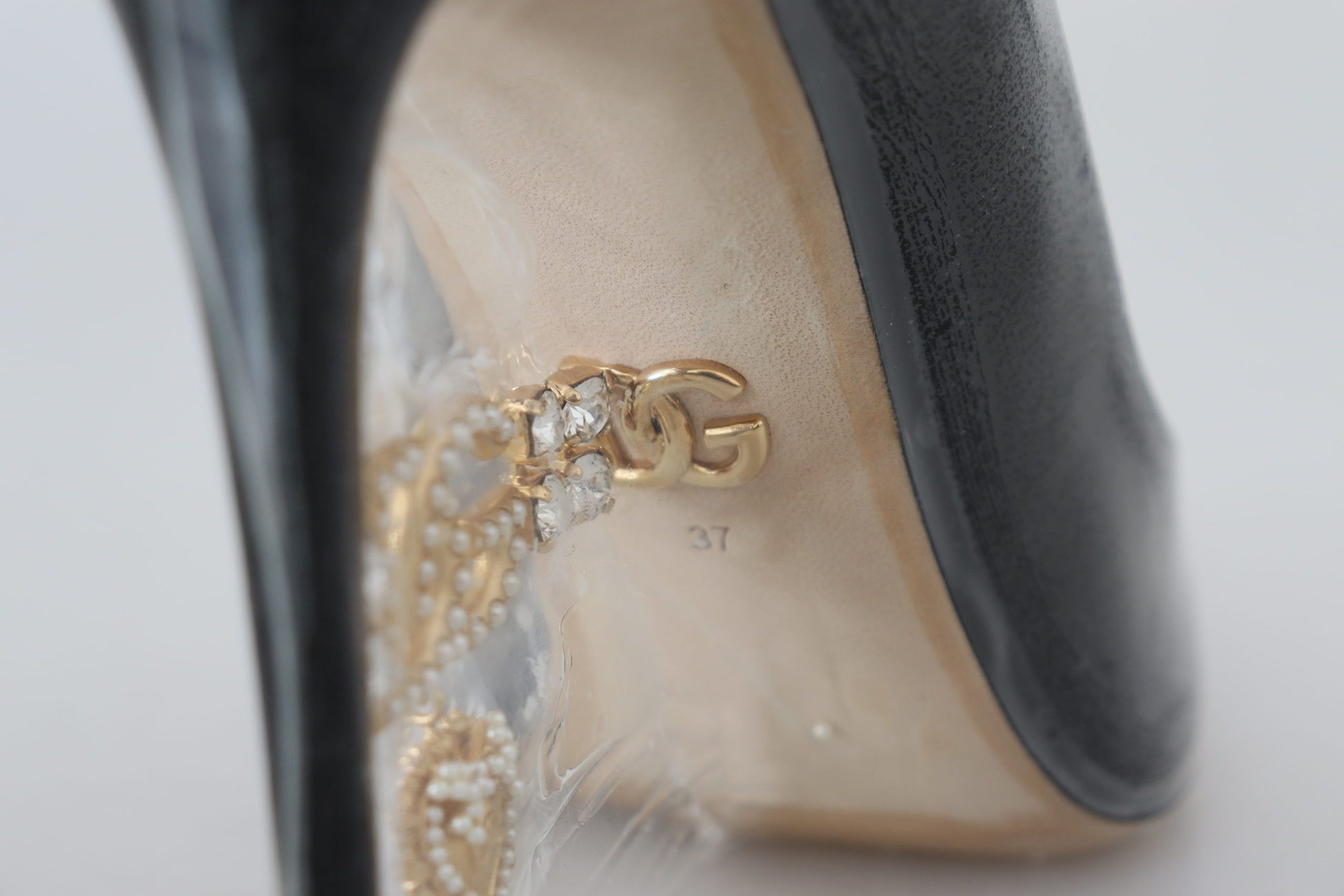 Escarpins à talons en cuir noir Dolce &amp; Gabbana, chaussures enveloppées de plastique