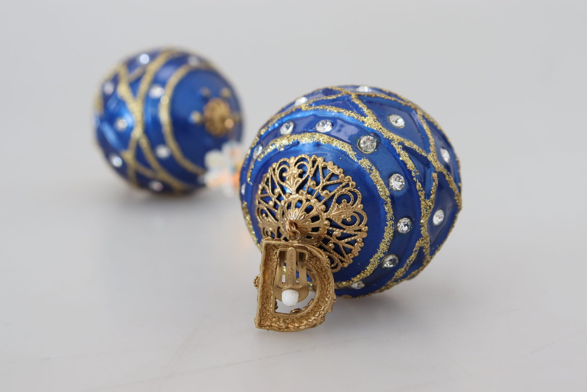 Boucles d'oreilles à clip Dolce &amp; Gabbana en laiton doré et cristal bleu