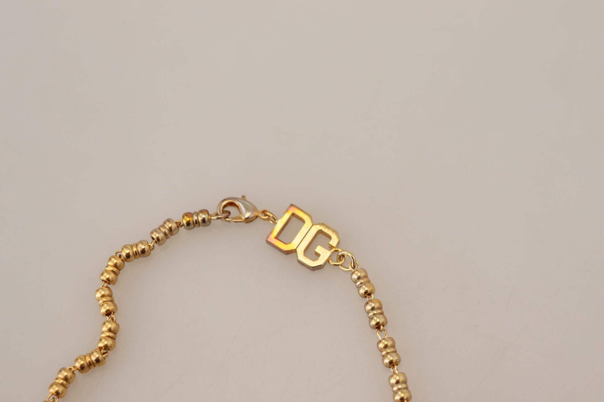 Collier Dolce &amp; Gabbana avec pendentif logo SUPER PIG en laiton doré