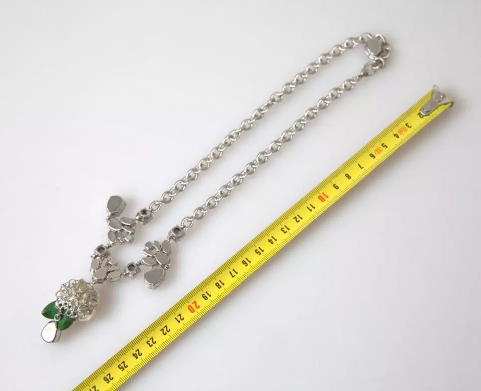 Collier Dolce &amp; Gabbana avec pendentifs roses en cristal transparent et laiton argenté