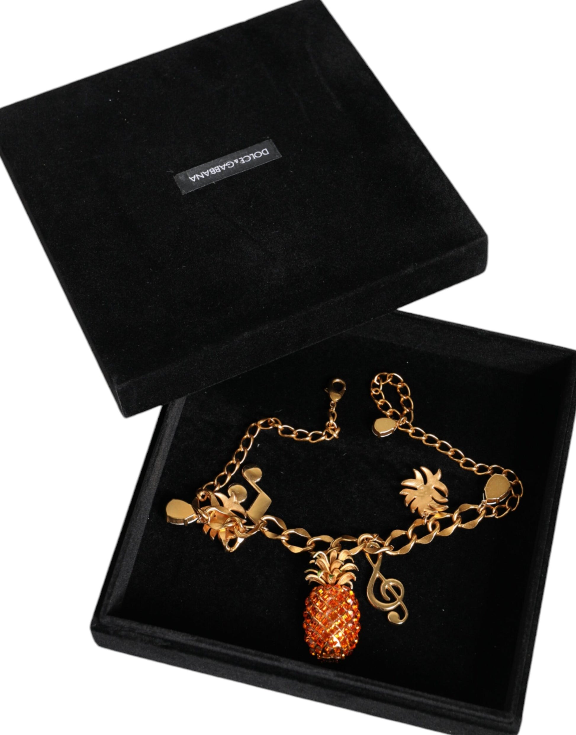 Collier musical Dolce &amp; Gabbana en laiton doré avec chaîne et cristaux ananas
