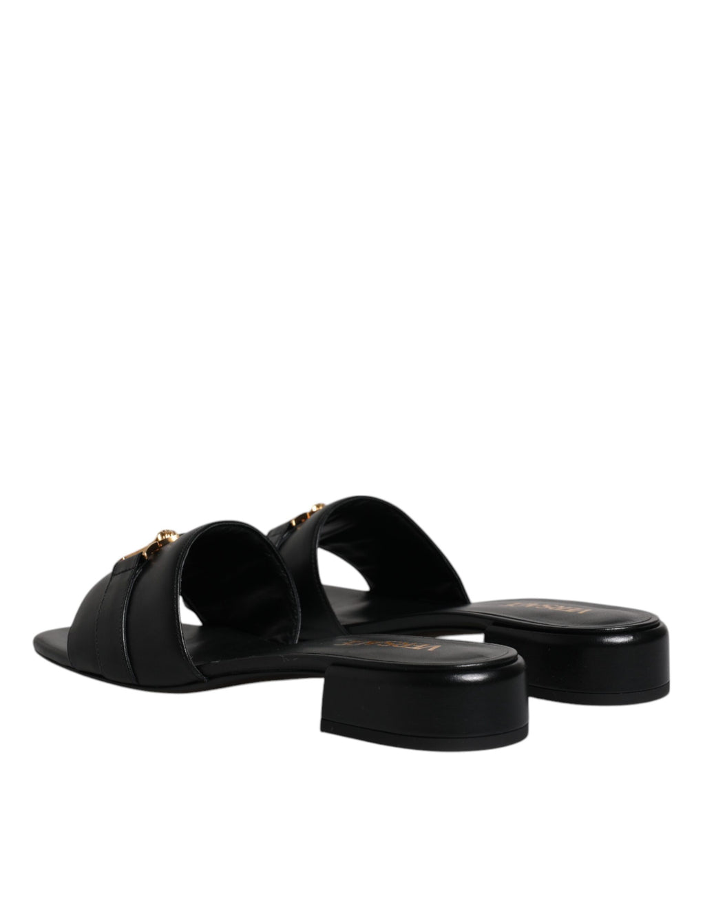 Claquettes plates à enfiler en cuir noir avec plaque logo Versace