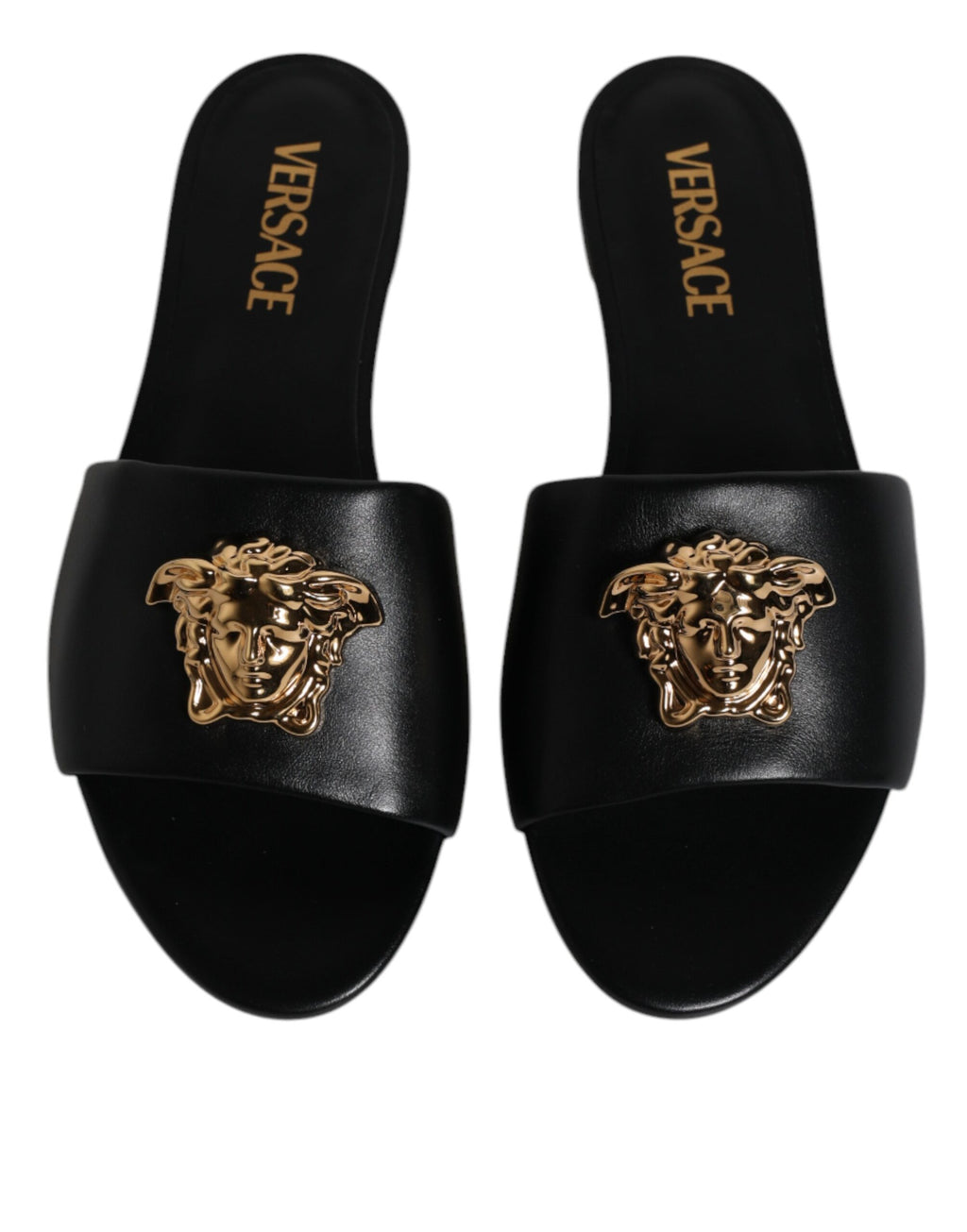 Claquettes plates à enfiler en cuir noir avec plaque logo Versace
