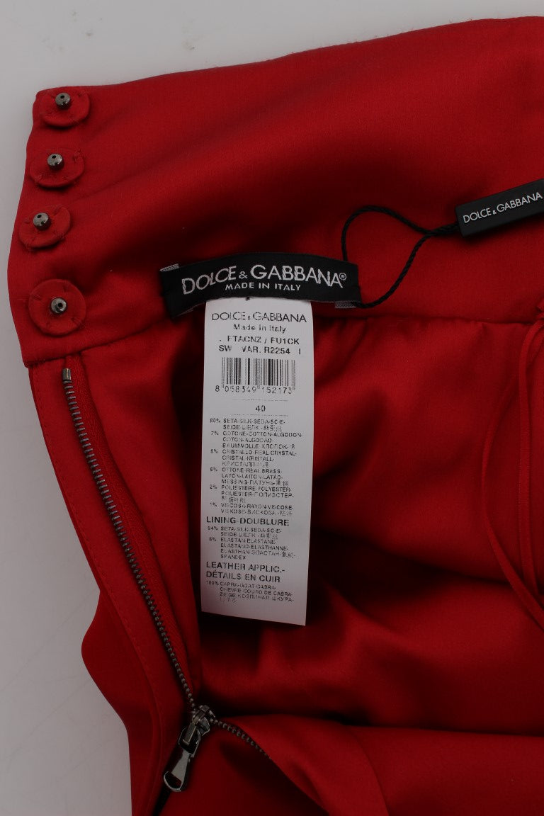 Short Dolce &amp; Gabbana en soie rouge avec cristaux roses 