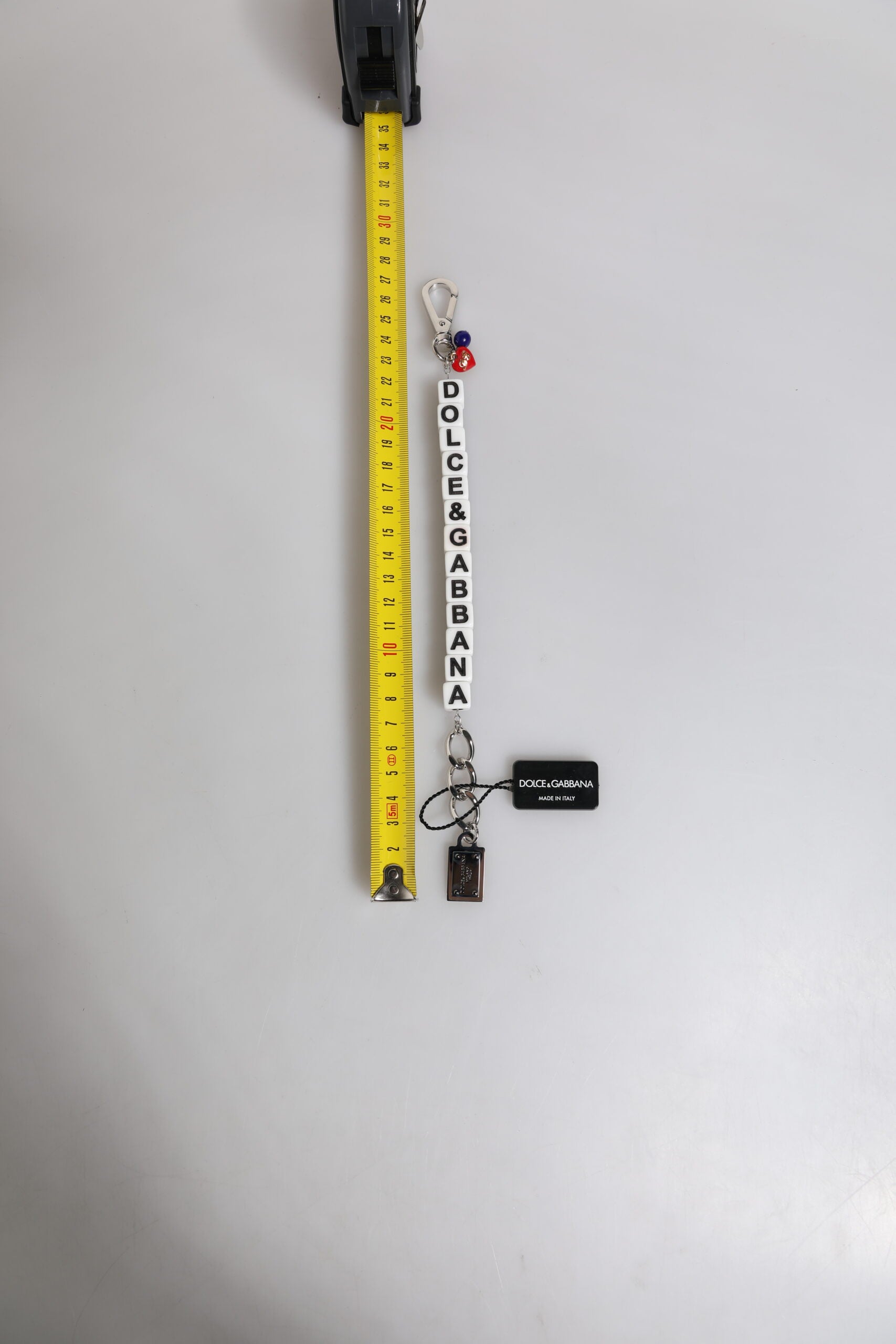 Bracelet à breloques Dolce &amp; Gabbana en laiton argenté avec logo en forme de dés