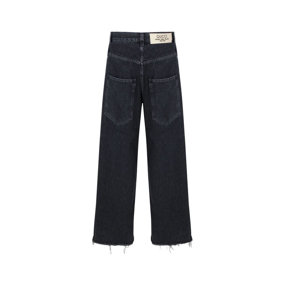 Jean en denim à jambe large Gucci