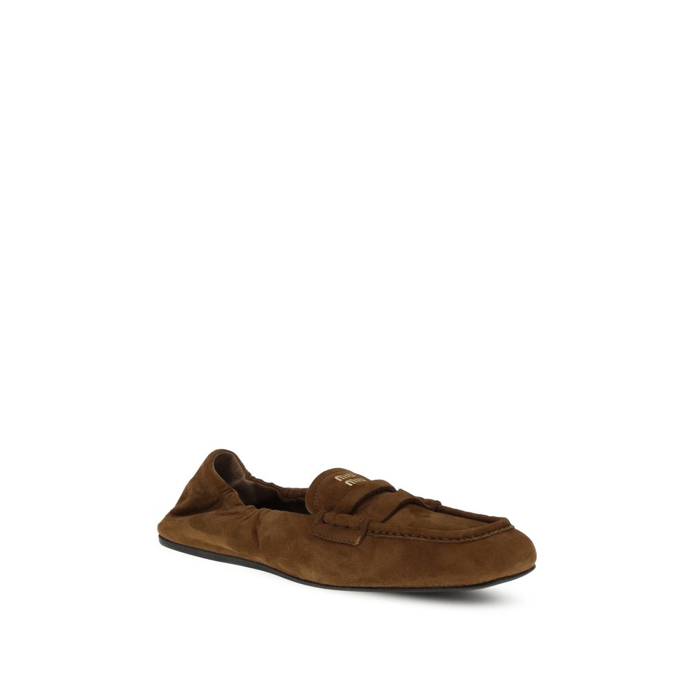 Mocassins Miu Miu en daim à volants